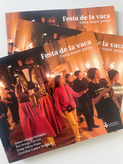 La Festa de la Vaca en un llibre de fotografies.